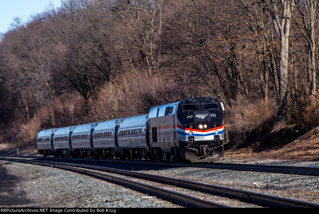 AMTK 717 leads southbound Empire Service train 